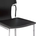 Set di quattro sedie da pranzo laterali con schienale parzialmente aperto in metallo nero e argento e pelle